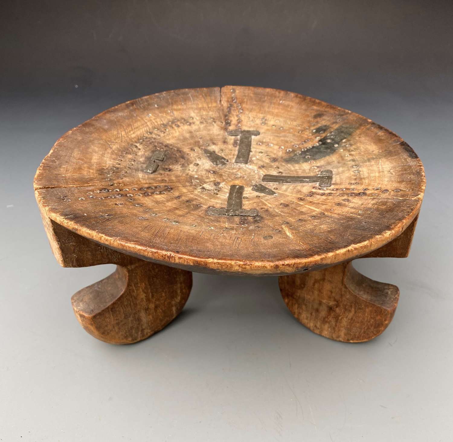 A Kamba Stool with Brass and Pewter designs Kenya 