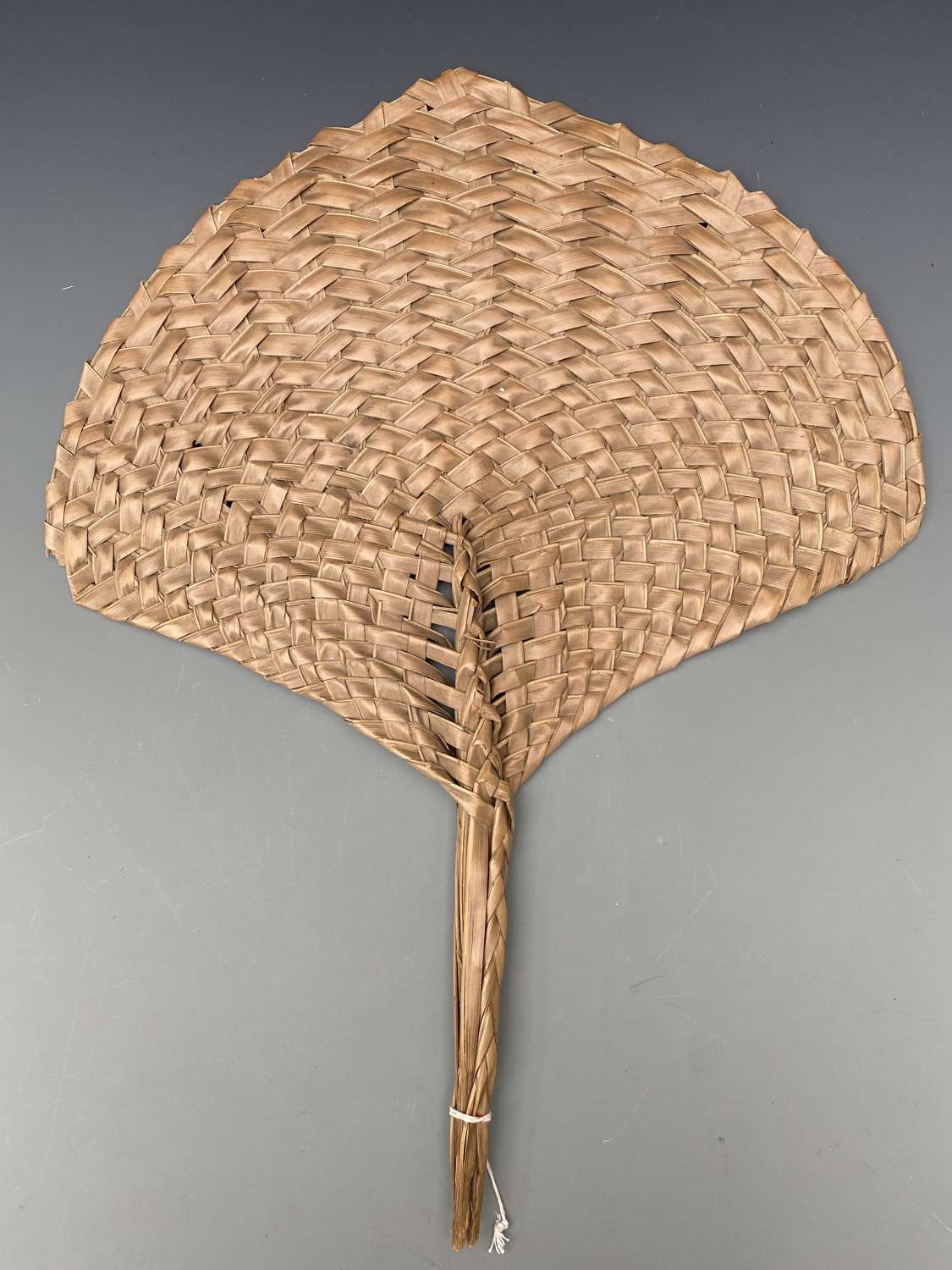 A Samoan Fan ( coconut palm leaf )